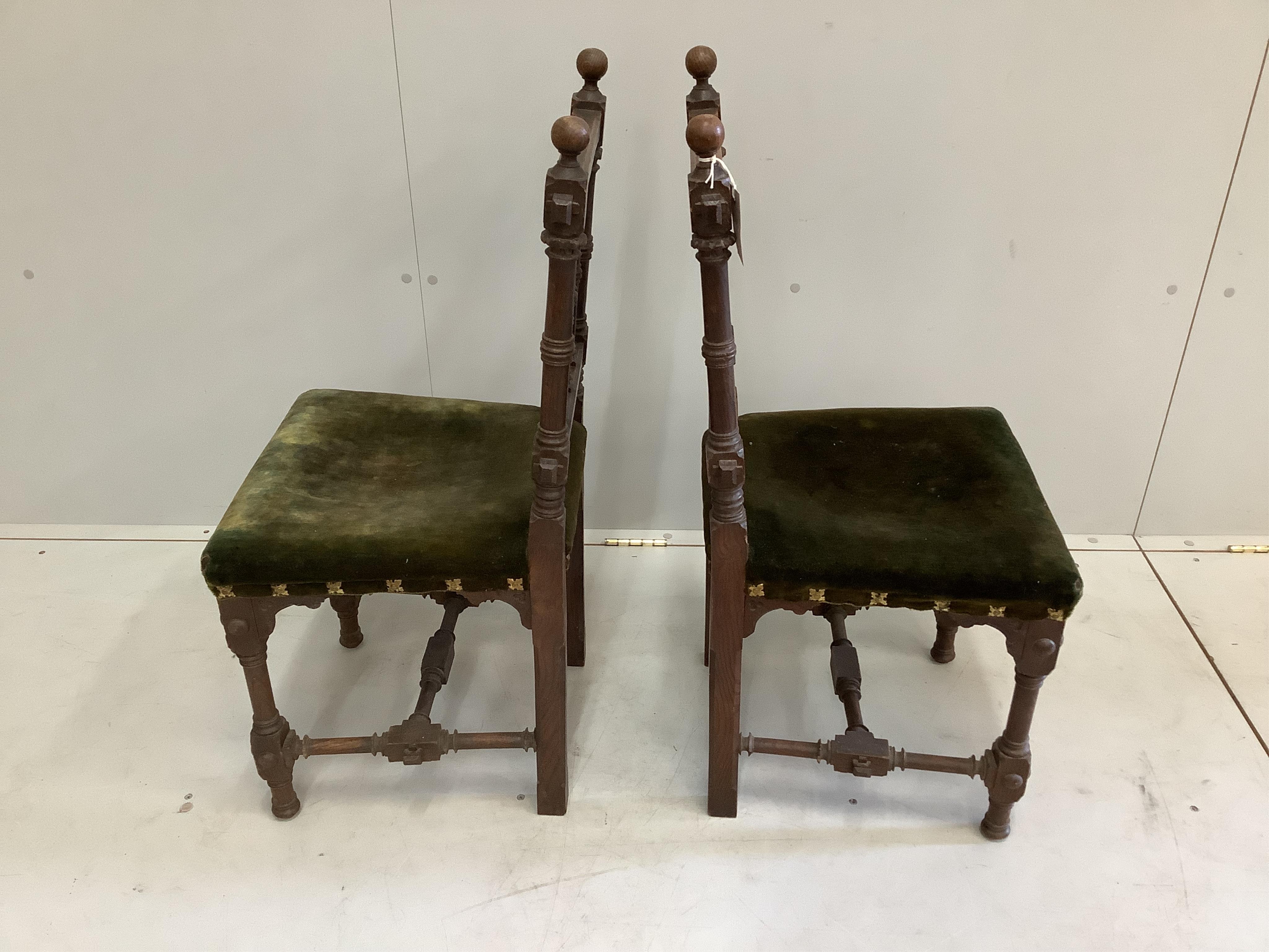 A pair of Victorian Gothic style oak side chairs